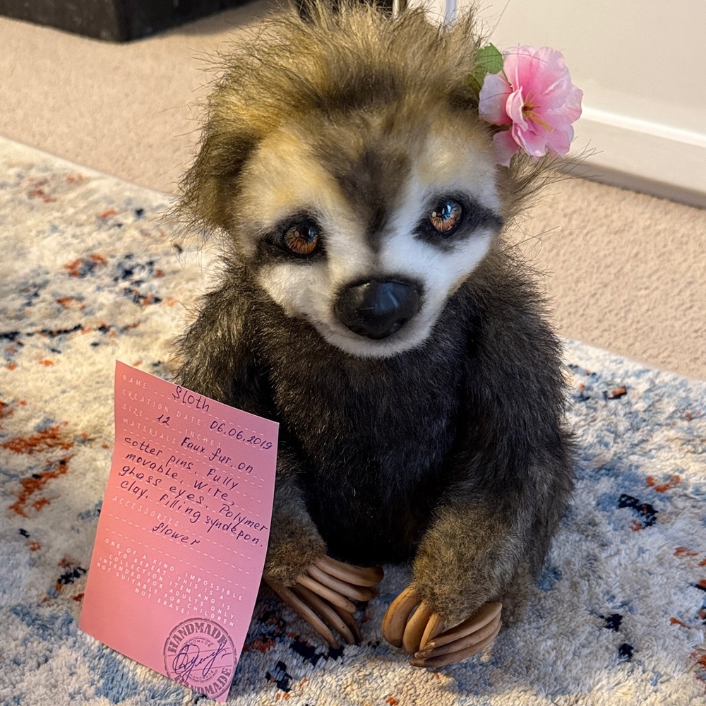 Charming Plush Sloth with Pink Flower
